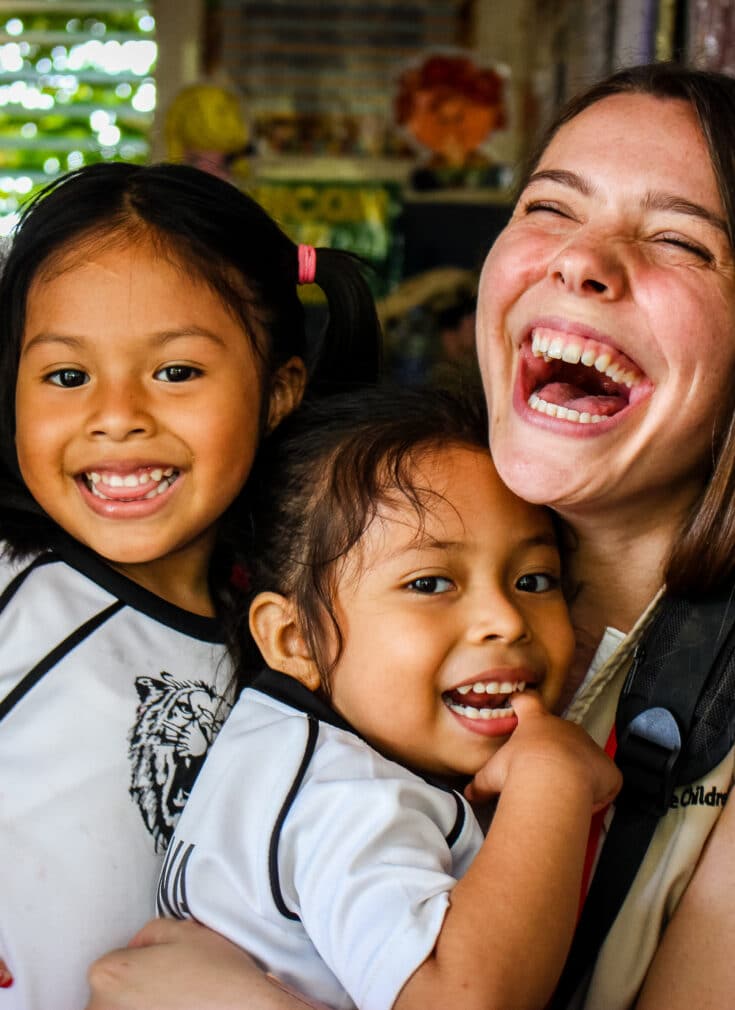 ulisa_and_Valentina_embrace_Save_the_Children_staff_member_Victoria_Zegler